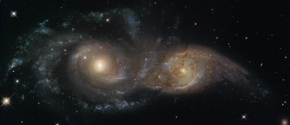 Colliding Galaxies IC 2163 and NGC 2207 in Canis Major